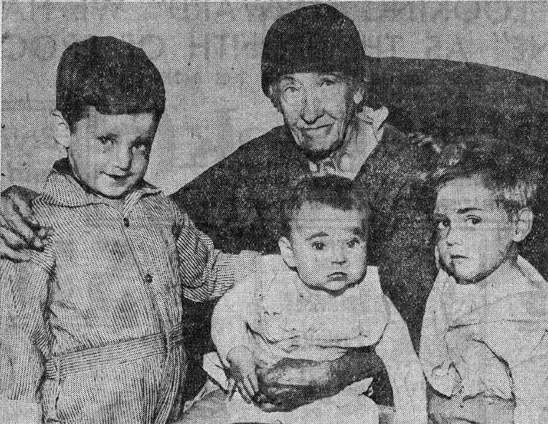 Mrs. Mary Havlick with Weller twins Russell and Albert Jr. and baby Doris, after Burns Street fire, June 1933