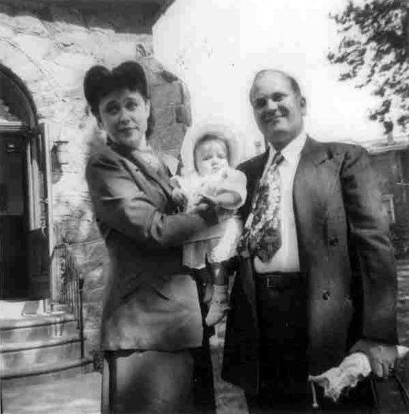 Evelyn and David Reich of 2627 Cramer Street with daughter Janice, outside Holy Trinity Lutheran Church, circa 1952