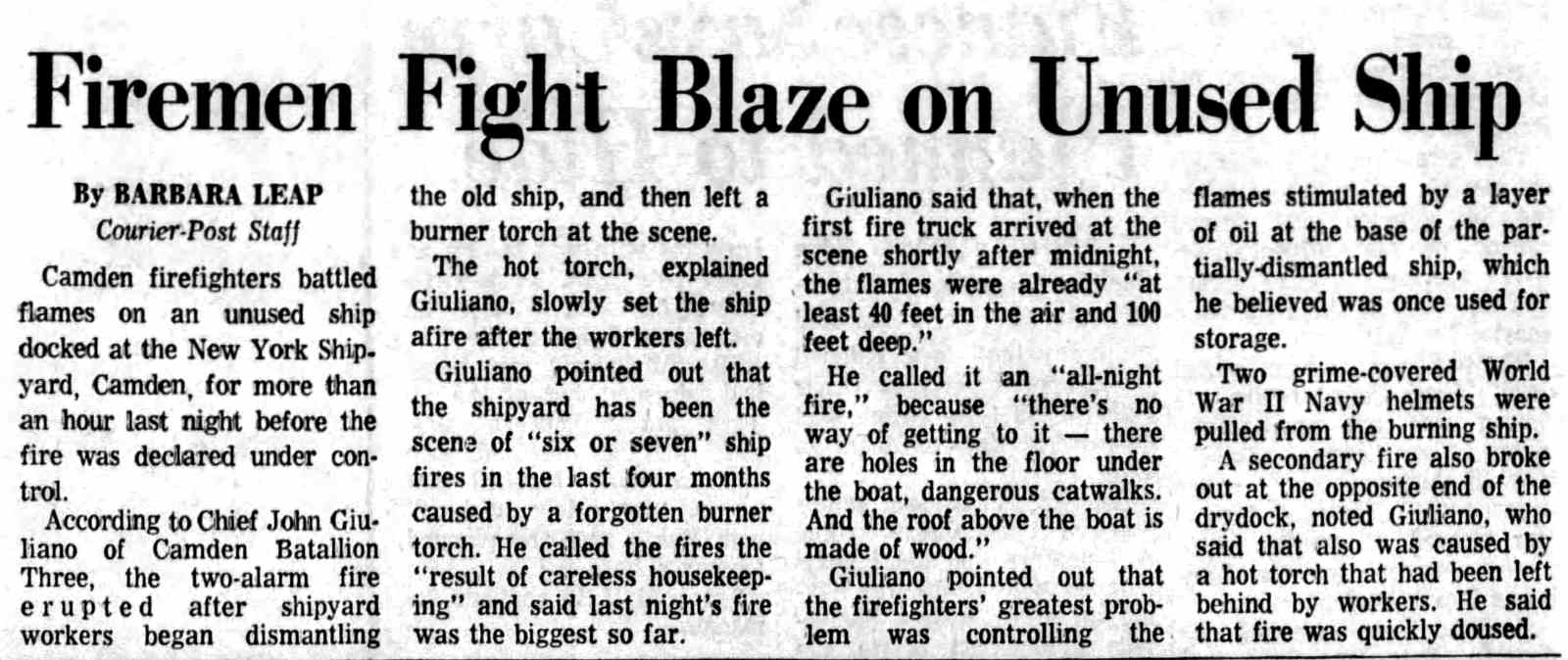 Firemen fight blaze on unused ship, New York Shipyard, January 1974