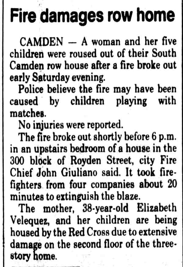 Fire damages row home, Royden Street, April 1982