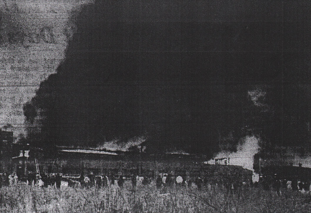Dense smoke billows from former John R. Evans Company leather tanning plant in North Camden. Photo by Robert Cave.