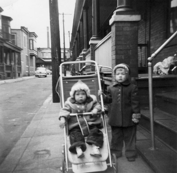 Linda Boris in a stroller with Chris Boris at 716 Grant Street, 1956