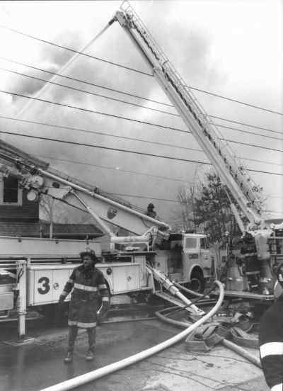 Ladder 3 and Ladder 1 at the Third Alarm fire at 909–911 North 24th Street, December 17, 1991