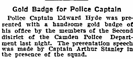 Gold Badge for Police Captain newspaper clipping