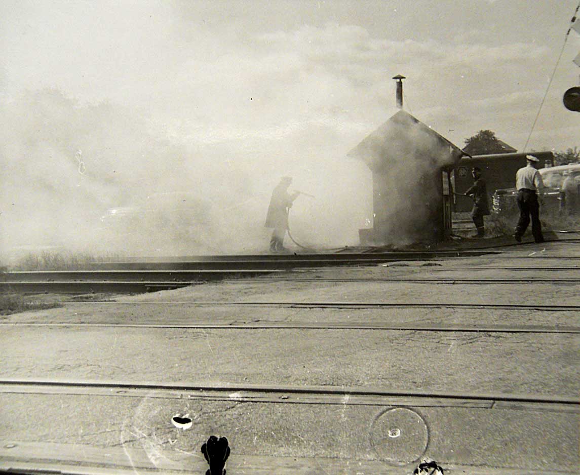 Camden Fire Department at the railroad crossing guard shack, sometime after 1956
