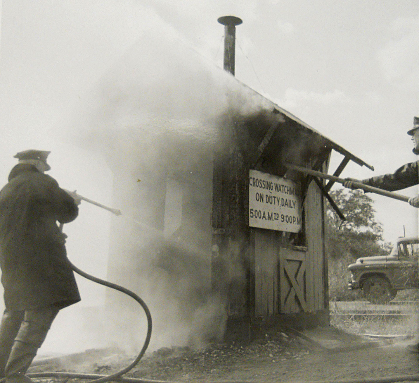 Camden Fire Department at the railroad crossing guard shack, sometime after 1956