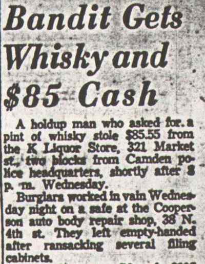 Bandit Gets Whisky and $85 Cash newspaper clipping