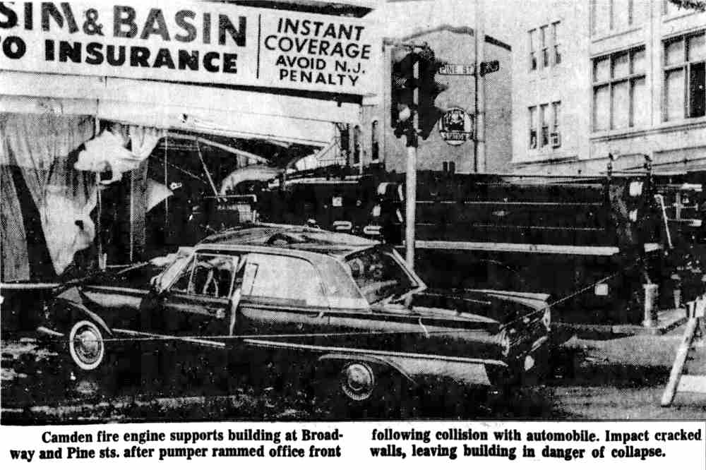 Fire engine propped against a damaged Camden office front at Broadway and Pine Streets, Philadelphia Inquirer, Jan. 6, 1964