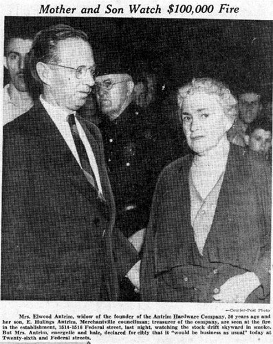 Courier-Post photo of Mrs. Elwood Antrim and her son E. Hulings Antrim watching the Antrim Hardware fire, June 30, 1939
