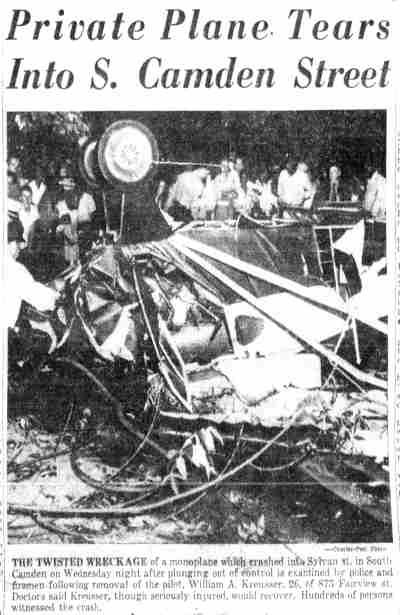 Courier-Post photo of a wrecked monoplane on Sylvan Street, 1953