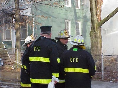 Four Camden firefighters in CFD coats